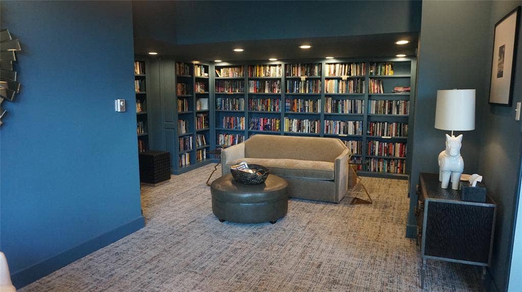 3883 Turtle Creek Boulevard, #1114, Dallas, TX 75219 Built-in bookshelves with recessed lighting