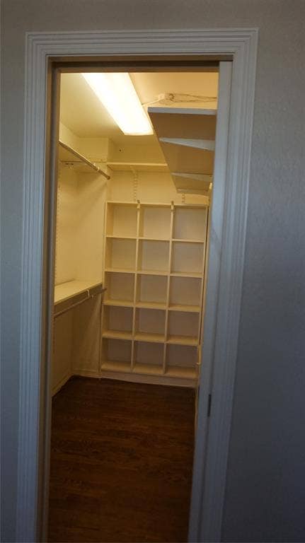 3883 Turtle Creek Boulevard, #1114, Dallas, TX 75219 Built-in closet shelving, wood-finish flooring, and integrated overhead lighting