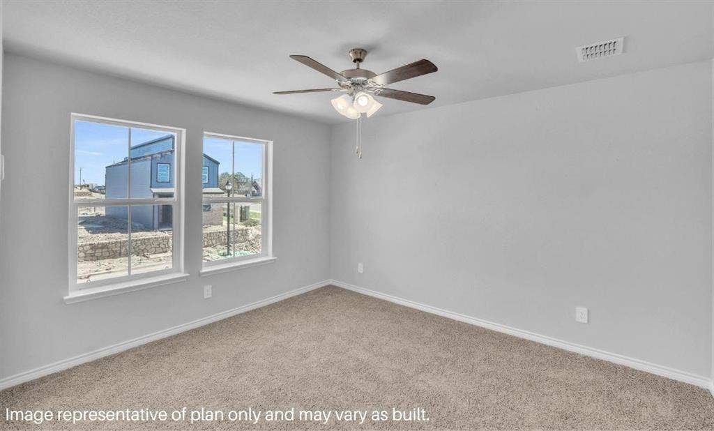 3308 Blue Jay Way, Richland Hills, TX 76118 Two large windows, carpeted flooring, and a ceiling fan with integrated lighting