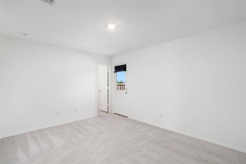 250 Herman Lane, Princeton, TX 75407 Recessed ceiling light, light-colored carpeting, white interior walls, white interior doors