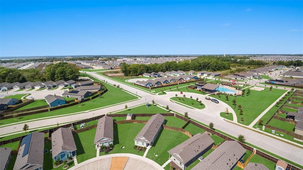 250 Herman Lane, Princeton, TX 75407 Community with a central amenity center, outdoor swimming pool, and dedicated green spaces