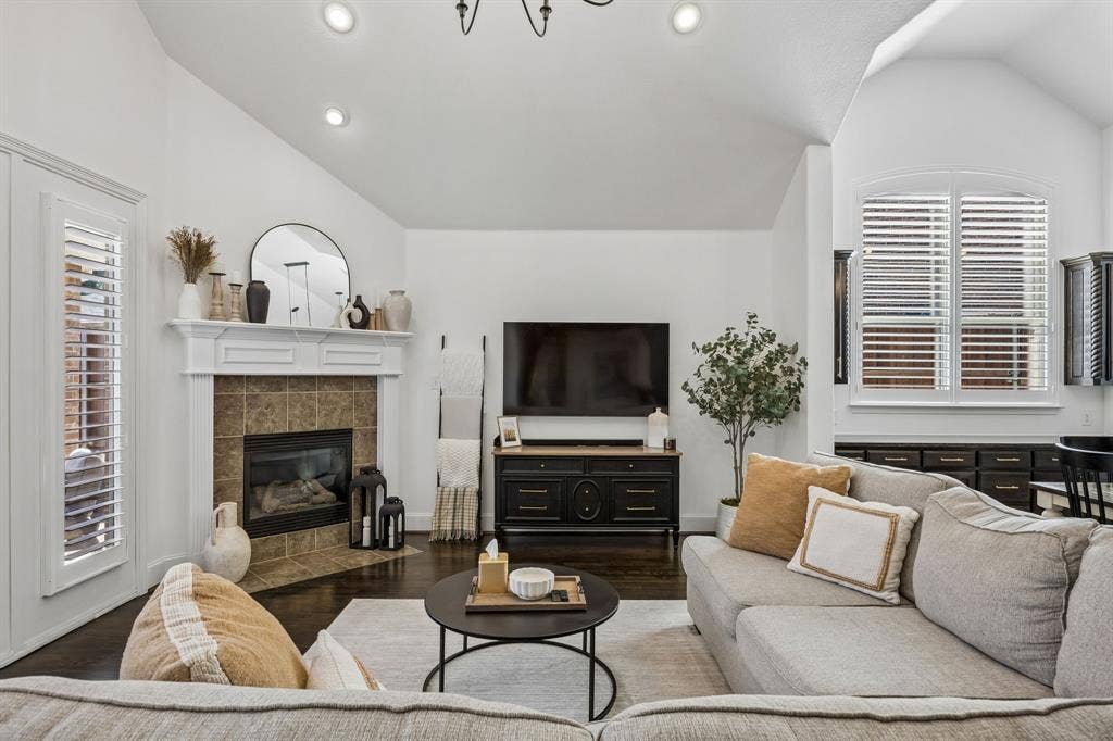 2403 Laguna Lane, Arlington, TX 76012 Living room with a fireplace and recessed lighting.