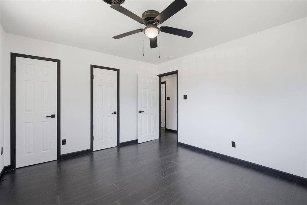 2313 Clearview Drive, Fort Worth, TX 76119 Dark wood-finish flooring with coordinating baseboards