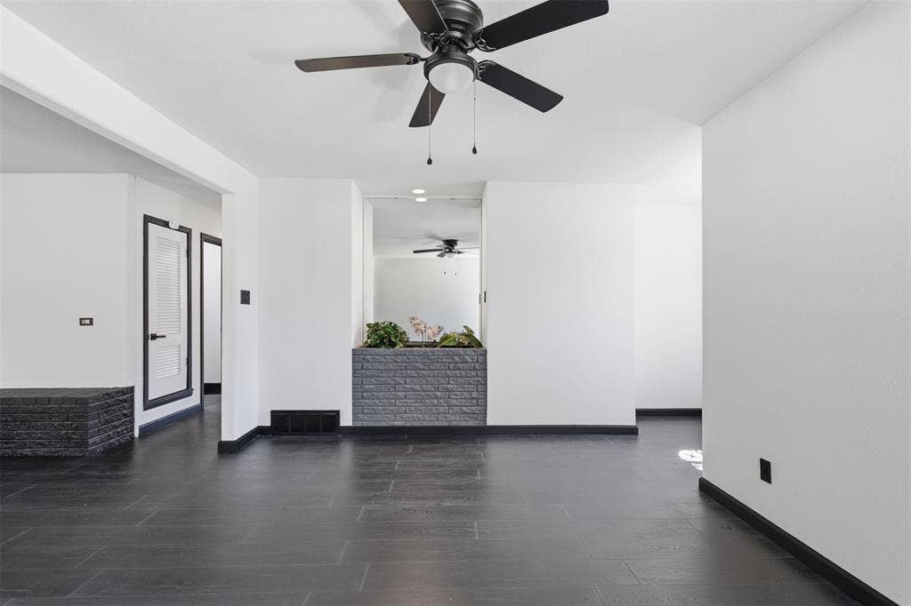 2313 Clearview Drive, Fort Worth, TX 76119 Dark wood-finish flooring with white walls