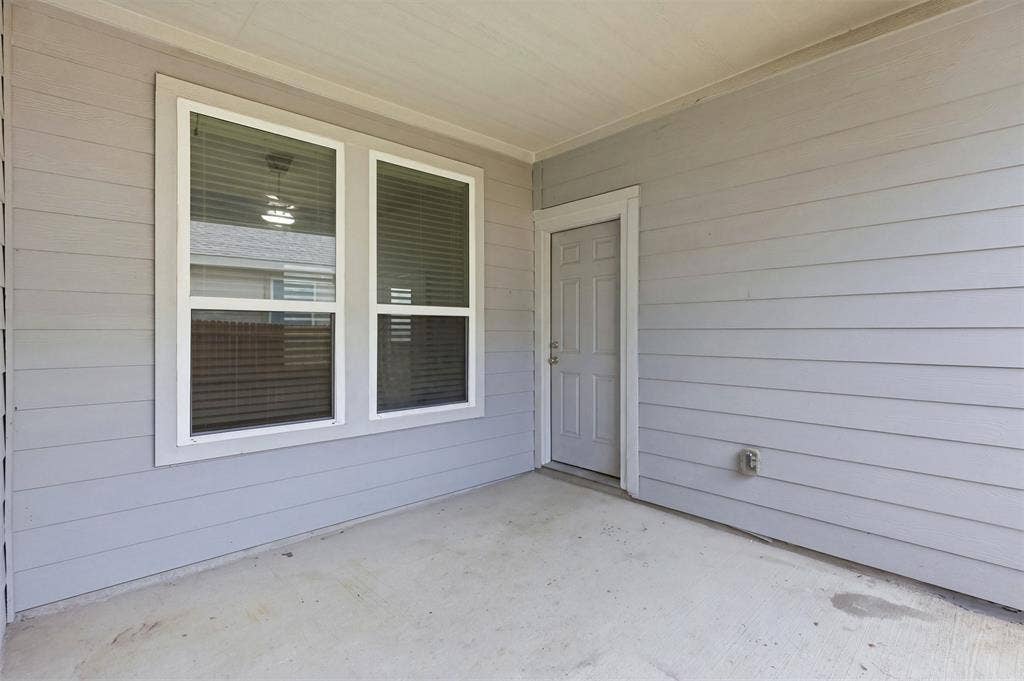 1978 Sunnybrook Drive, Heartland, TX 75126 Patio door that leads to garage