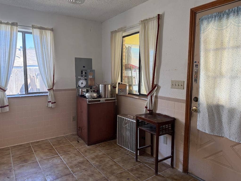 Breakfast area with door to mudroom