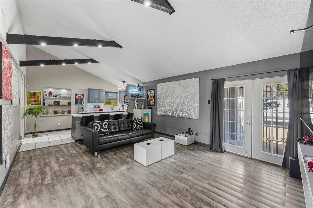 6606 Coleshire Drive, Dallas, TX 75232 Vaulted ceiling with exposed beams and recessed lighting
