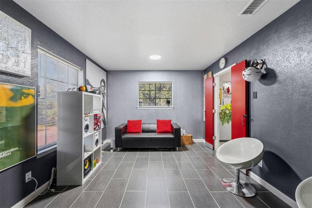 6606 Coleshire Drive, Dallas, TX 75232 Tile flooring, dual windows with blinds, recessed ceiling lighting, and red double doors