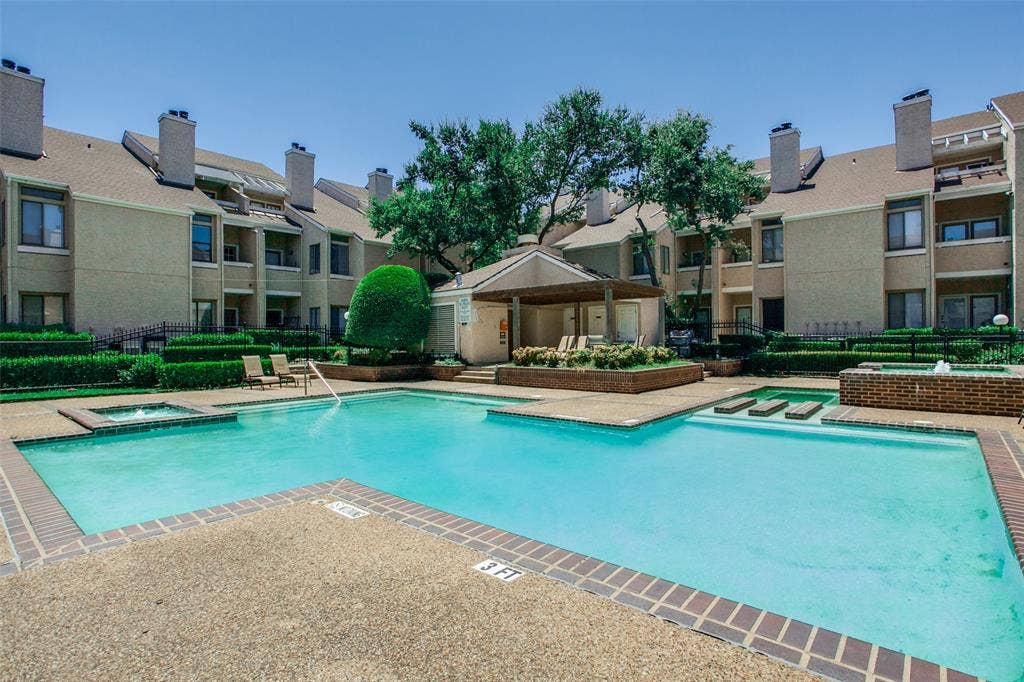 5550 Spring Valley Road, #C21, Dallas, TX 75254 Resort-style pool with integrated spa and brick coping