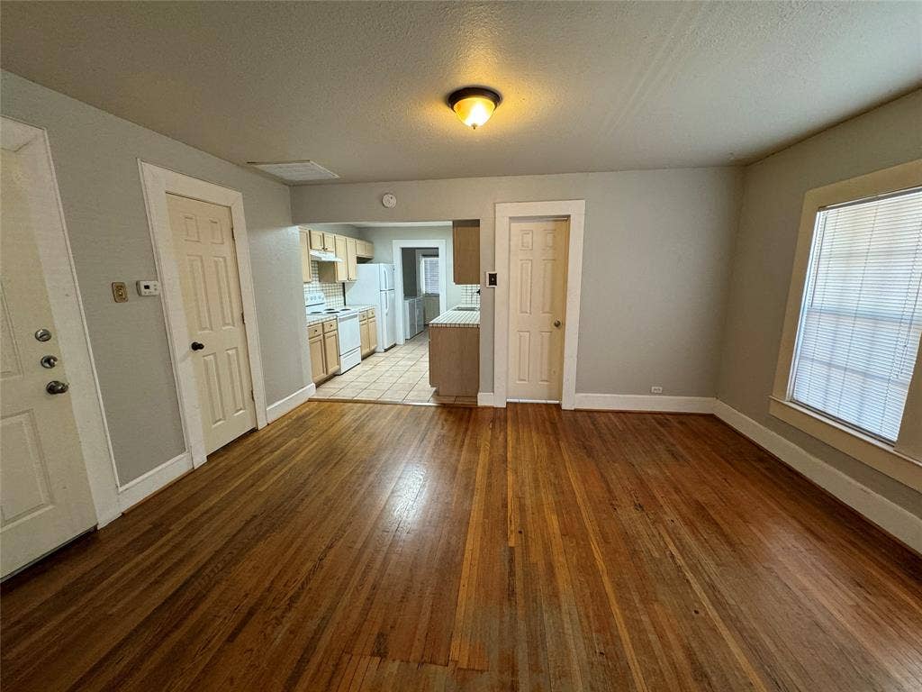 5321 Reiger Avenue, #4, Dallas, TX 75214 Spare room with a wealth of natural light and tile patterned flooring