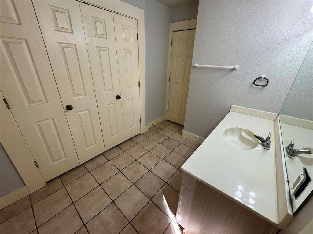 5321 Reiger Avenue, #4, Dallas, TX 75214 Bathroom featuring tile patterned flooring and sink