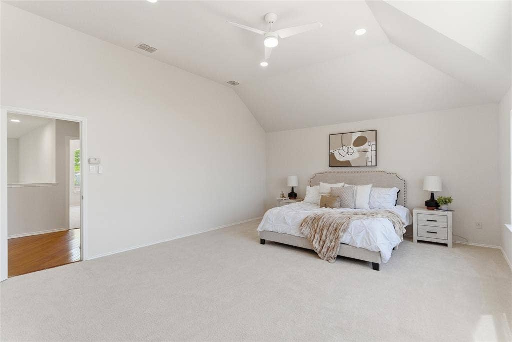 1416 Sunrise Lane, Sachse, TX 75048 Vaulted ceiling with a ceiling fan, recessed lighting, and soft carpet flooring