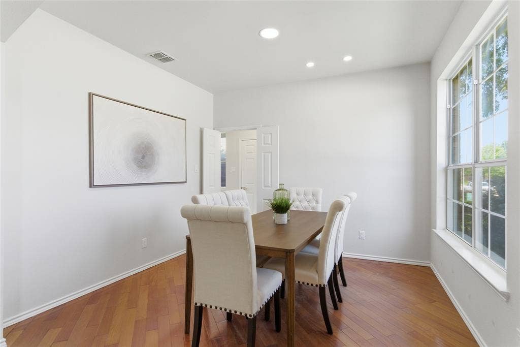 1416 Sunrise Lane, Sachse, TX 75048 Hardwood flooring, recessed lighting, double pane window, and light-toned walls