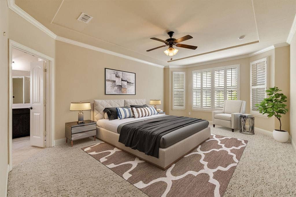 1049 Mesa Crest Drive, Fort Worth, TX 76052 Carpeted room featuring a bay window with plantation shutters, a ceiling fan, and crown molding