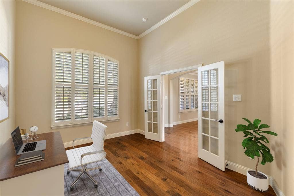 1049 Mesa Crest Drive, Fort Worth, TX 76052 Office featuring hardwood flooring, arched window with plantation shutters, French doors, and vaulted ceiling