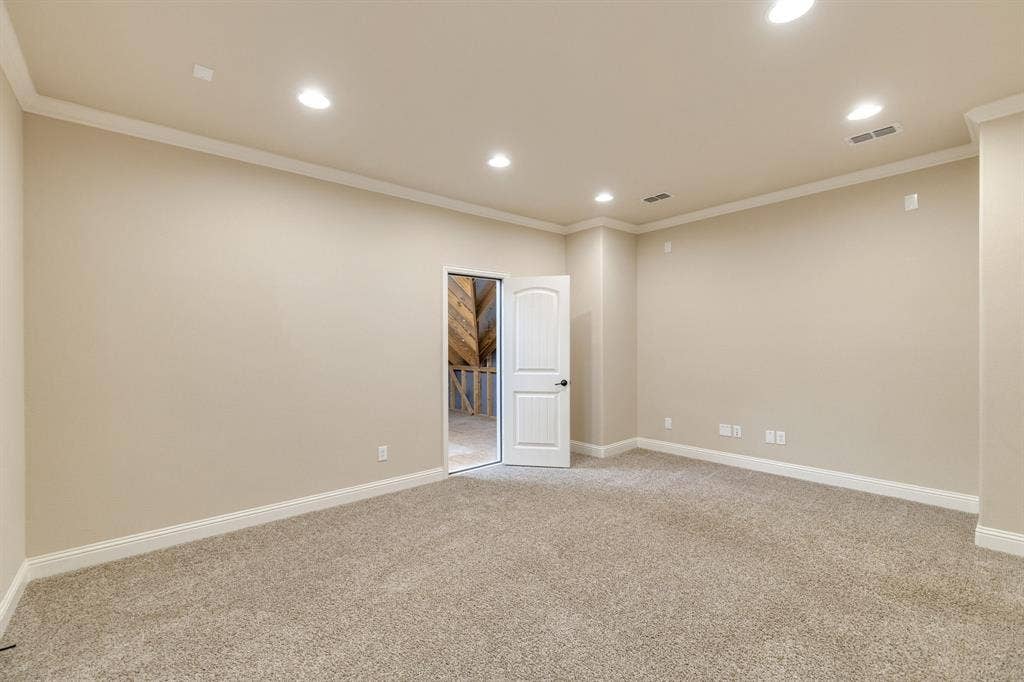 1049 Mesa Crest Drive, Fort Worth, TX 76052 Neutral-toned carpeting with recessed lighting