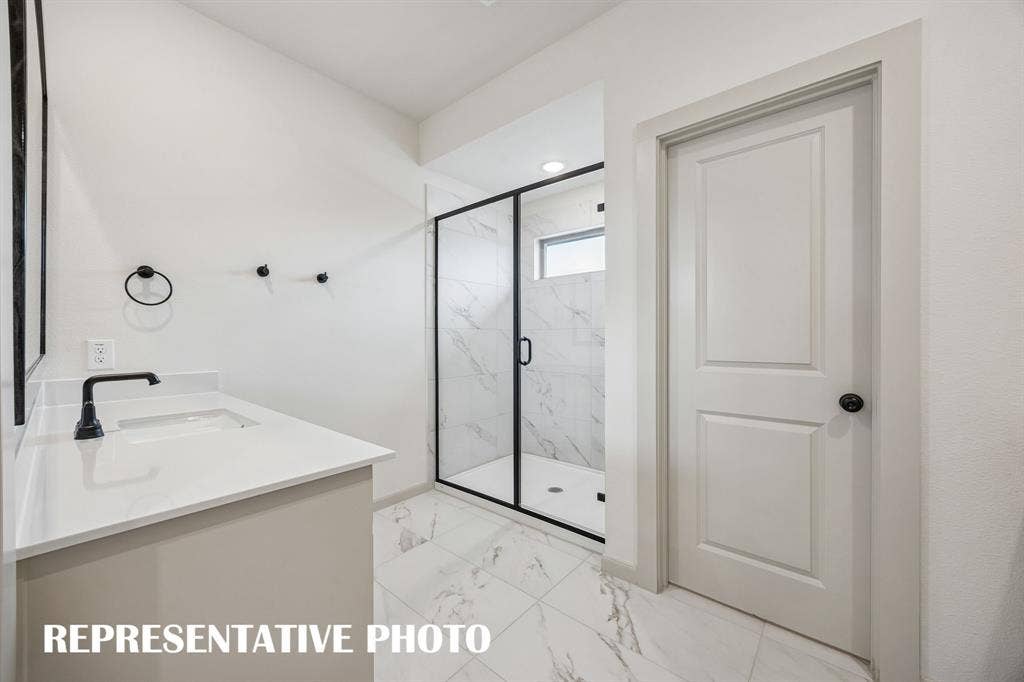 3729 Homer Court, McKinney, TX 75071 You'll enjoy the oversized walk in shower in this owner's bath. REPRESENTATIVE PHOTO