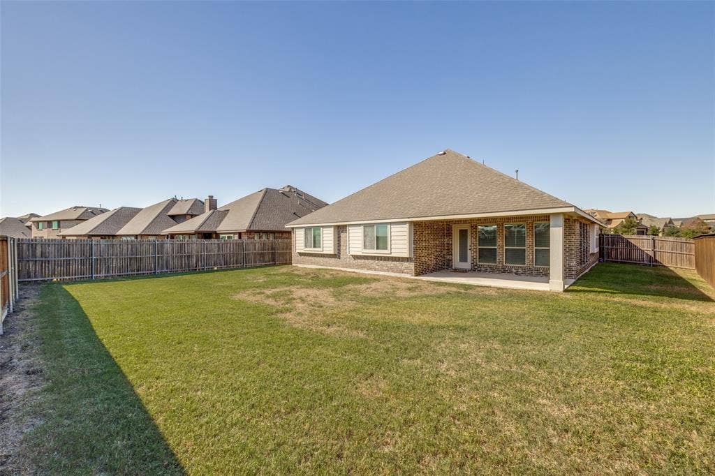 Another view of backyard which is large enough for a pool, if desired.