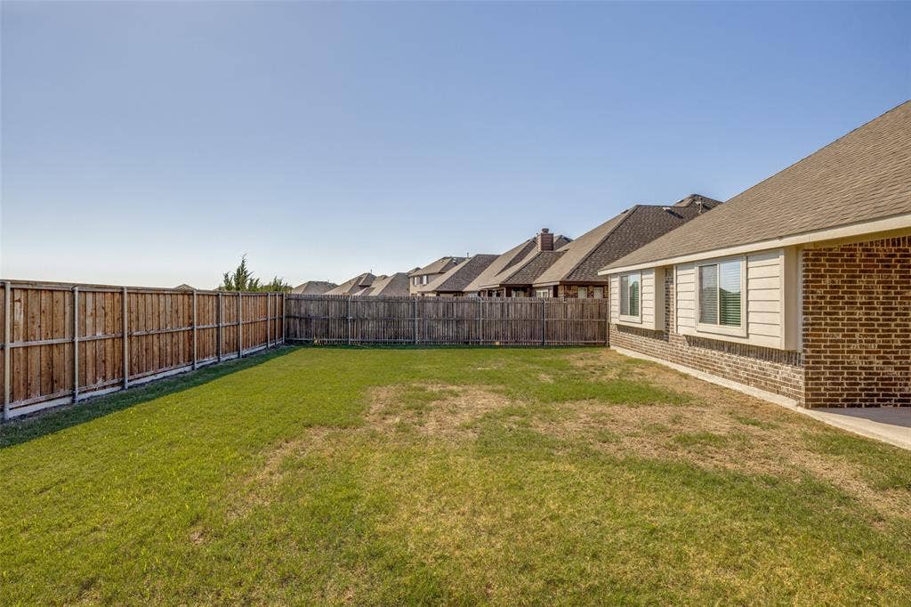 Sizable backyard for entertaining family and friends.