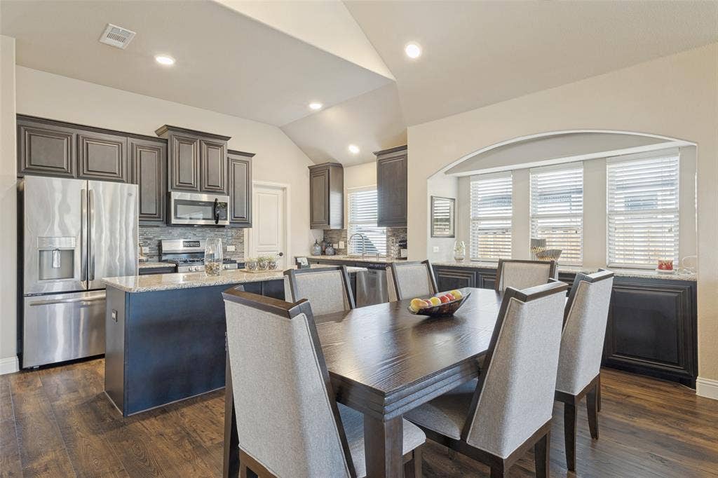View of dining area over looking kitchen.