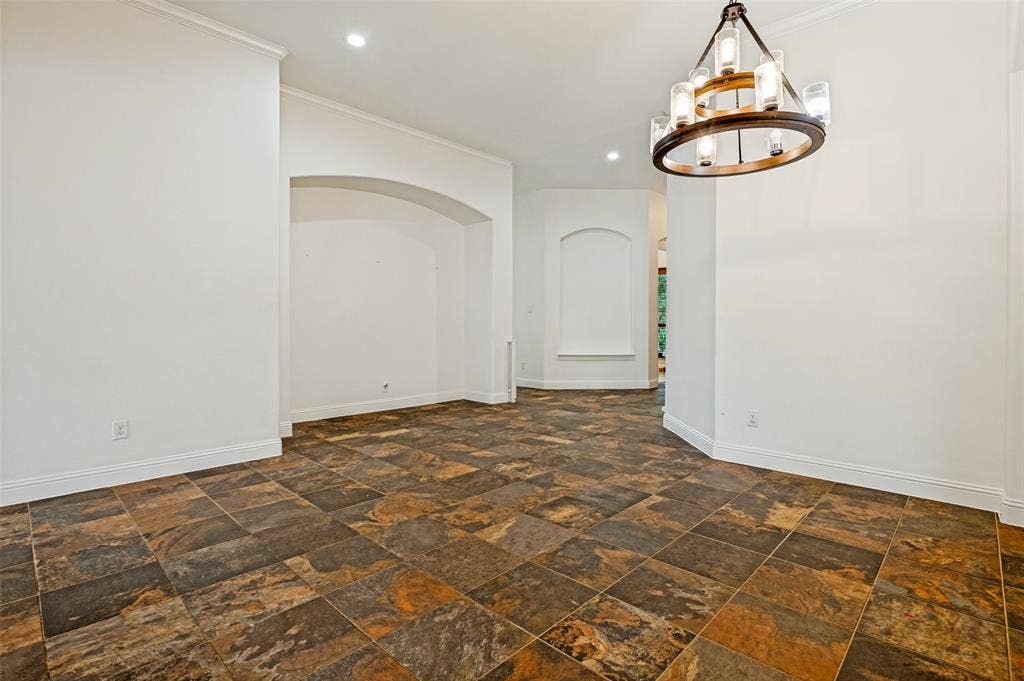 6734 Trailblazer Way, Dallas, TX 75236 Spacious interior featuring multi-toned tile flooring, recessed lighting, and a decorative chandelier