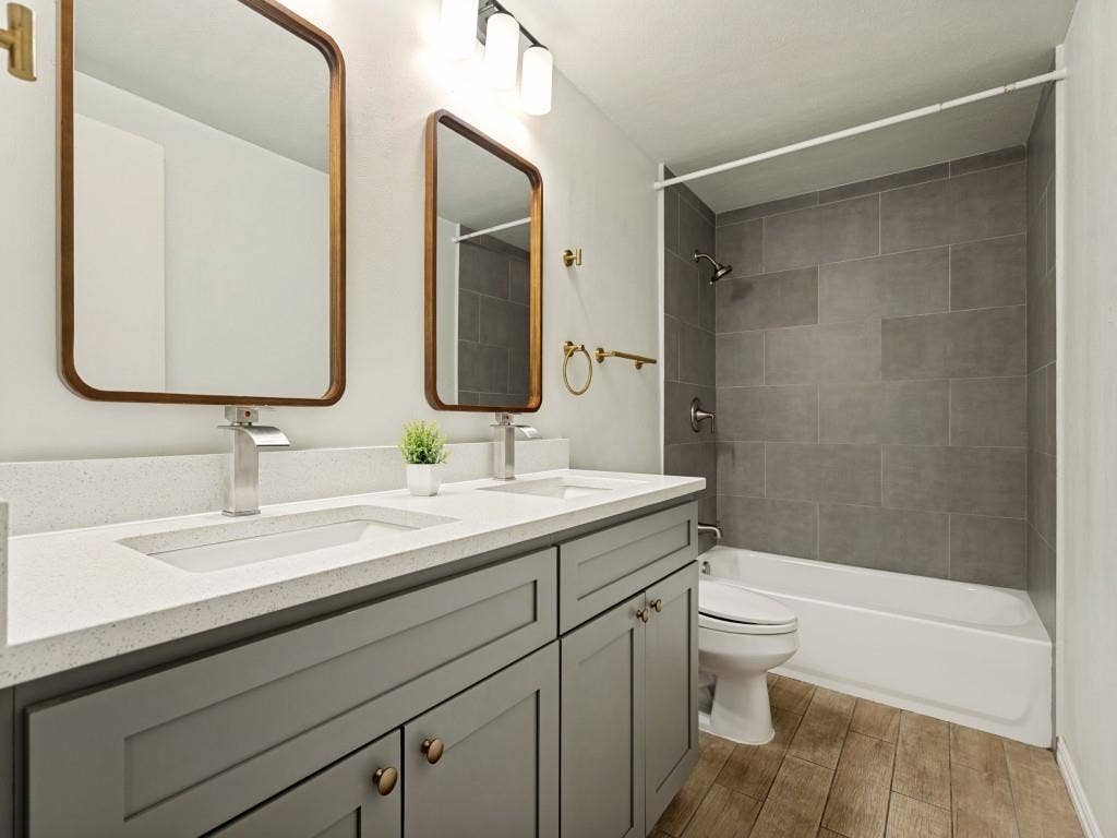 2018 Vail Drive, Garland, TX 75044 Dual vanity with rectangular undermount sinks, stone-finish countertop, and gray shaker-style cabinetry