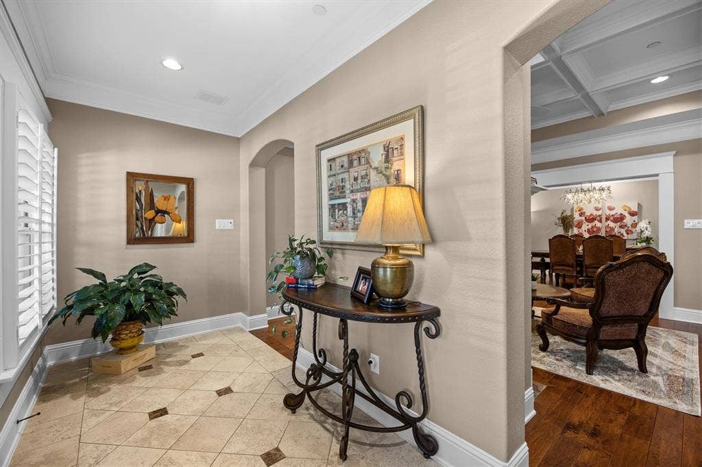 Tile flooring with diamond inlay and lots of cheerful light is the perfect "Welcome Home"!