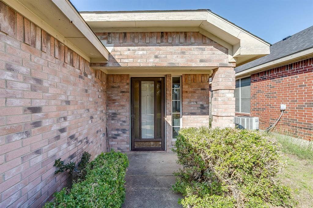 A lovely entry with covered doorway.