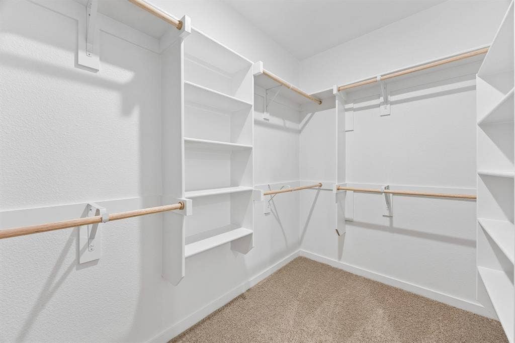 2708 Delevan Drive, Princeton, TX 75407 Primary Closet in the Cedar home plan – REPRESENTATIVE PHOTO