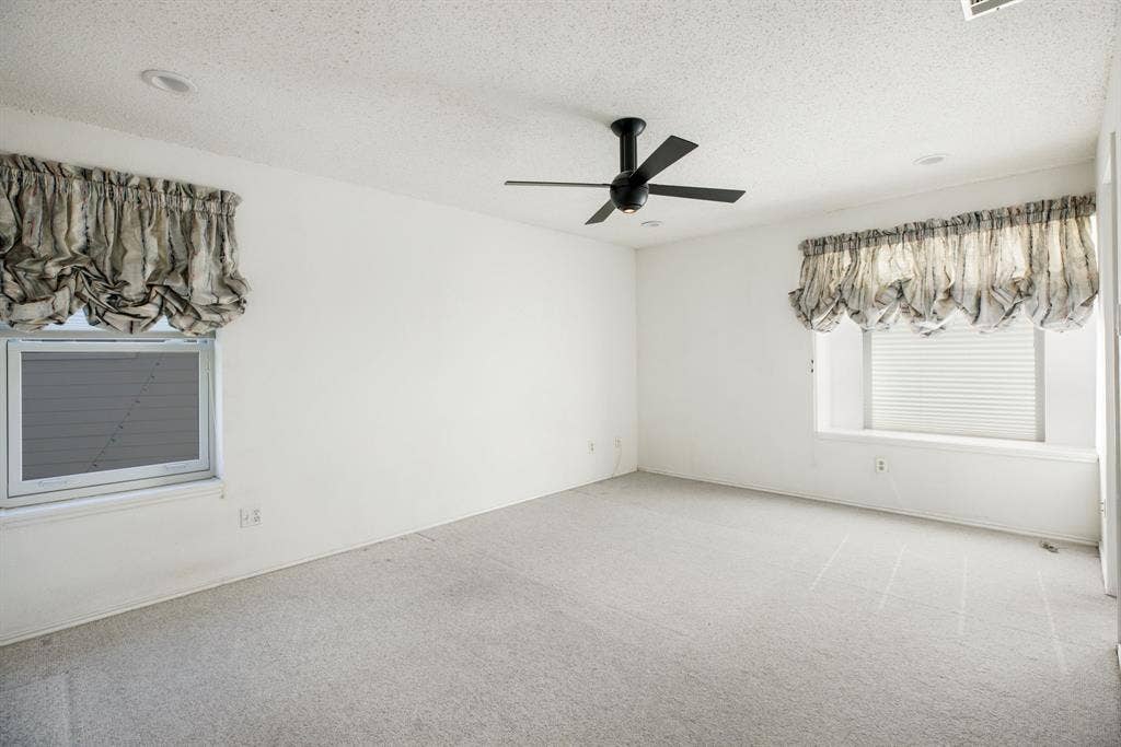 765 Eiffel Drive, Plano, TX 75023 White walls with carpet flooring, recessed lighting, and a ceiling fan