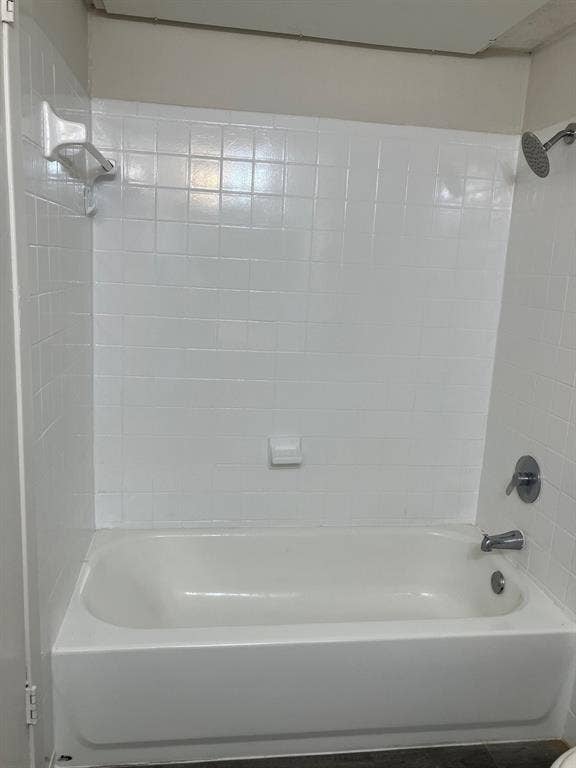 5727 Harvest Hill Road, #1042, Dallas, TX 75230 White subway tile surround with a built-in soap dish