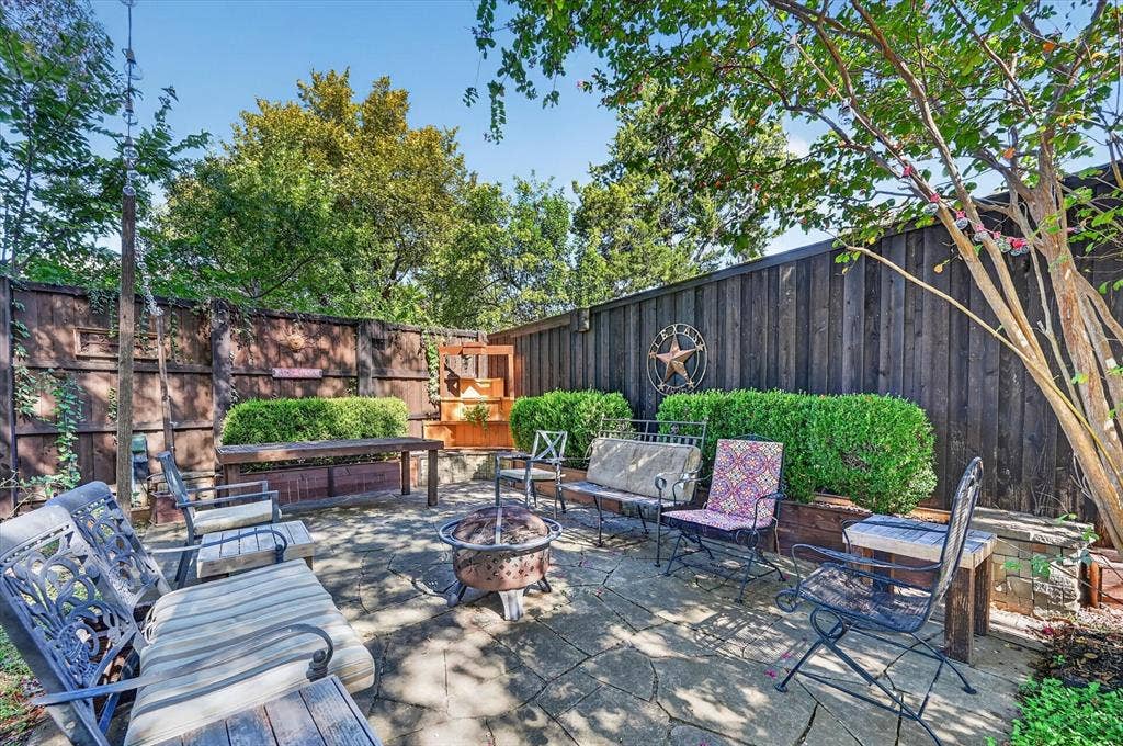 Nice board on board fence for extra privacy and a perfect area for family and friends to hang out with a fire.