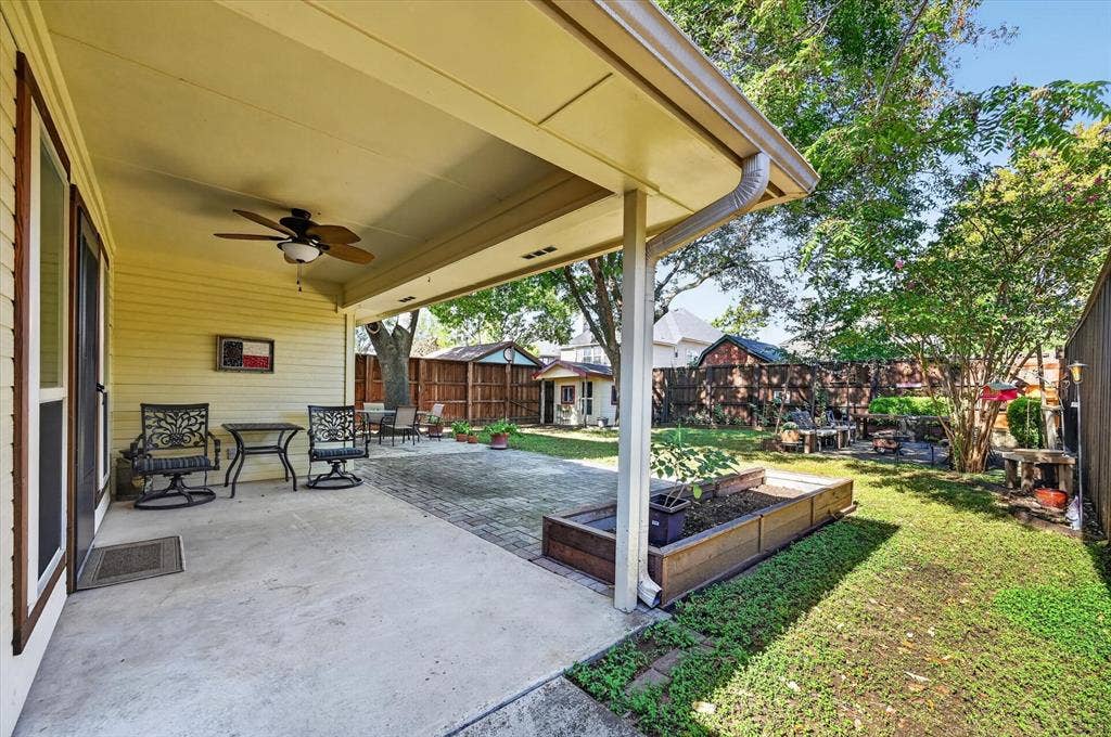 The patio is extended to offer a larger area for entertaining. There is a raised flower bed if you want to plant a vegetable garden.
