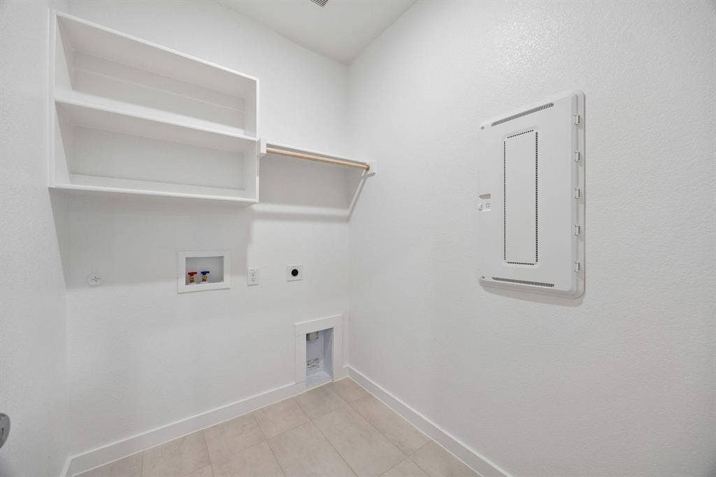 1333 Companero Street, Haslet, TX 76052 Utility Room in the Oscar home plan – REPRESENTATIVE PHOTO
