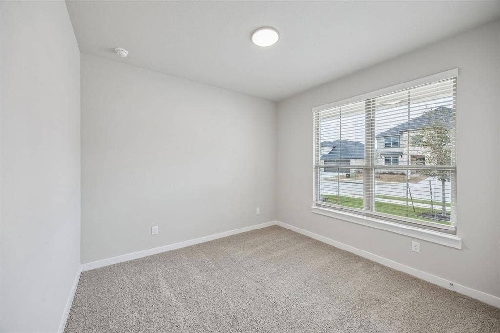 1321 Companero Street, Haslet, TX 76052 Bedroom in the Stanley II home plan – REPRESENTATIVE PHOTO