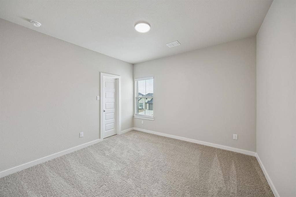 1321 Companero Street, Haslet, TX 76052 Bedroom in the Stanley II home plan – REPRESENTATIVE PHOTO