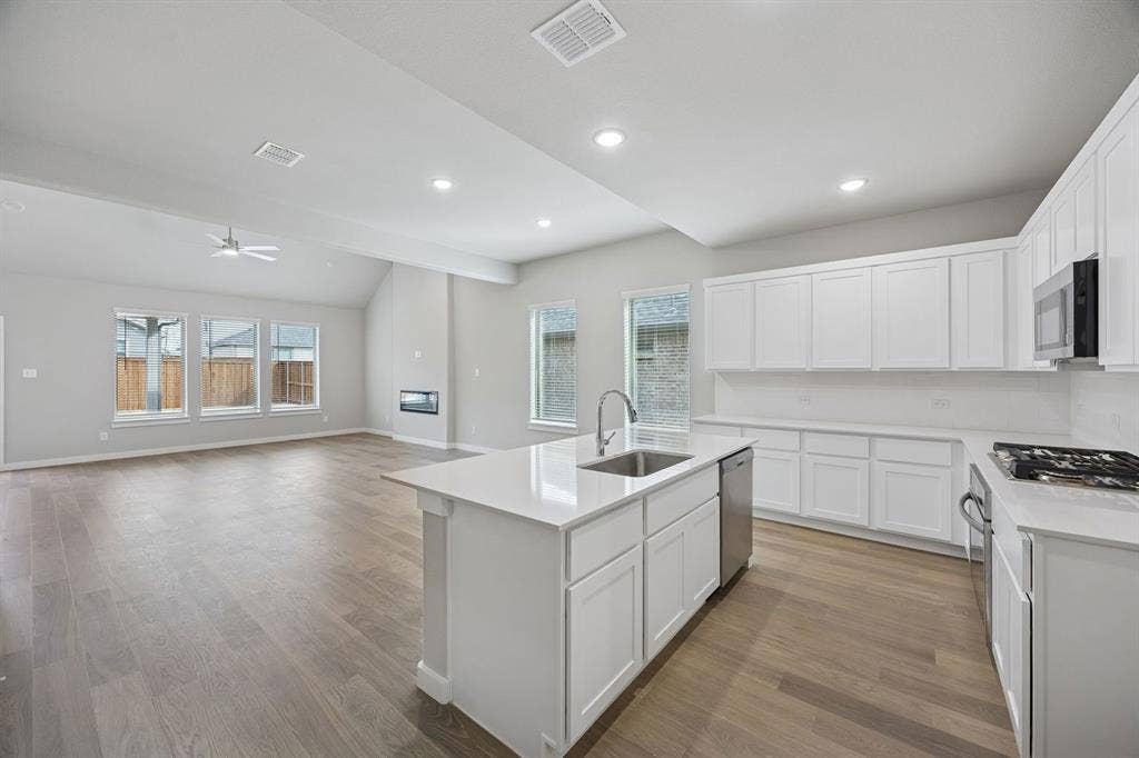 1321 Companero Street, Haslet, TX 76052 Open First Floor in the Stanley II home plan – REPRESENTATIVE PHOTO