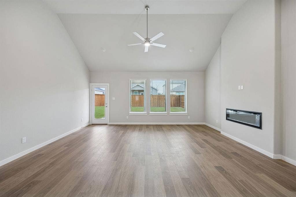 1321 Companero Street, Haslet, TX 76052 Living Room in the Stanley II home plan – REPRESENTATIVE PHOTO