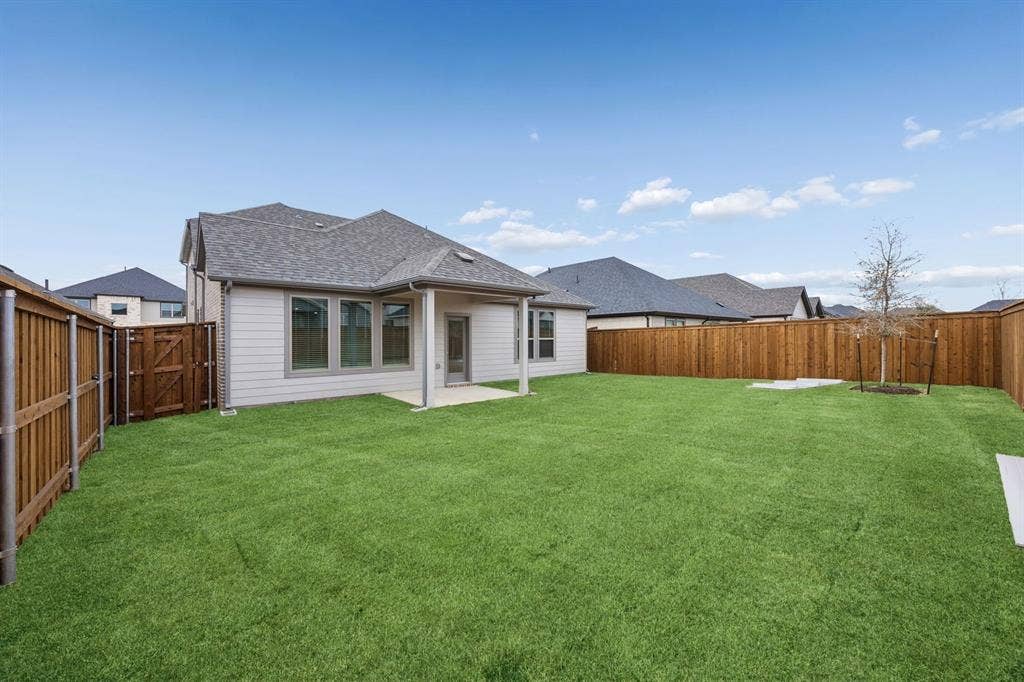 1321 Companero Street, Haslet, TX 76052 Covered Patio in the Stanley II home plan – REPRESENTATIVE PHOTO
