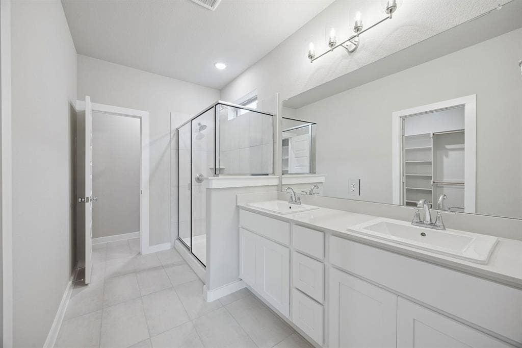 1321 Companero Street, Haslet, TX 76052 Primary Bathroom in the Stanley II home plan – REPRESENTATIVE PHOTO
