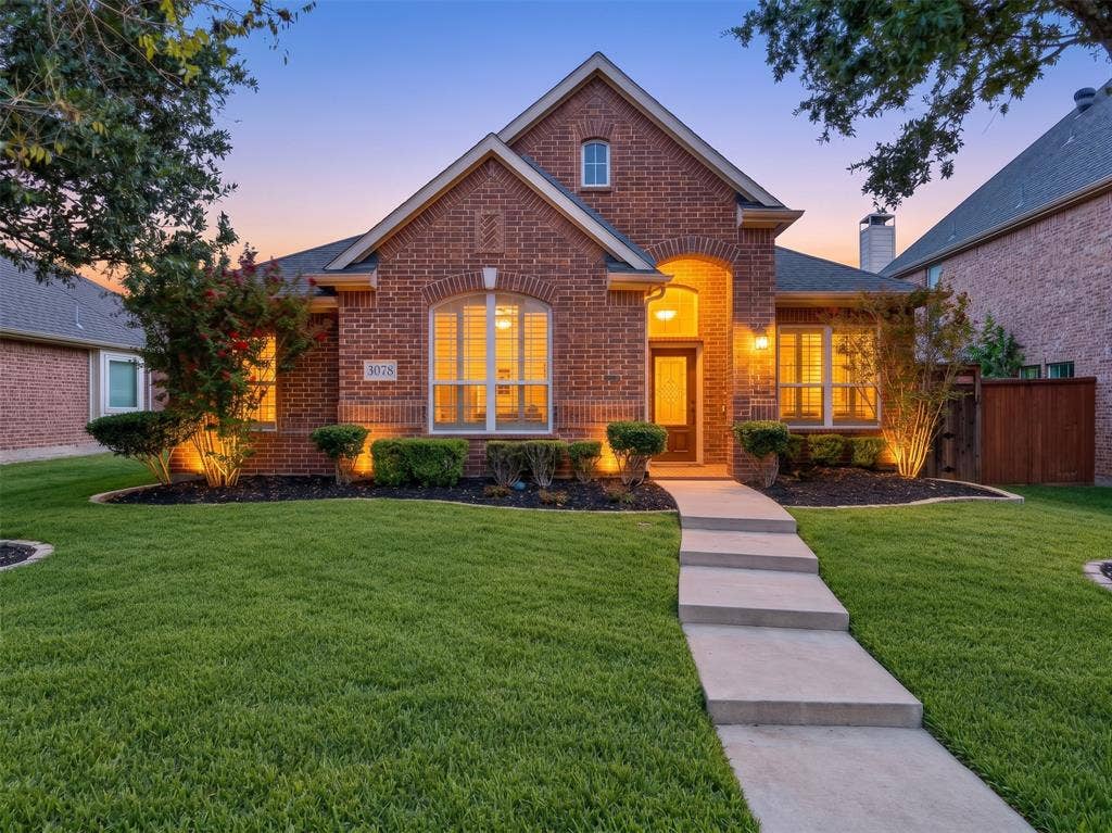 Brick exterior with arched entryway