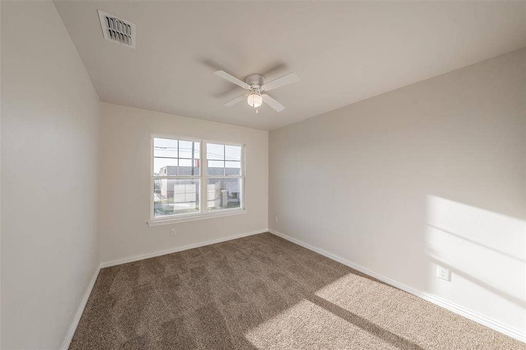 6215 Roby Drive, Arlington, TX 76001 Bedroom 2 , has ceiling fan and plush carpet