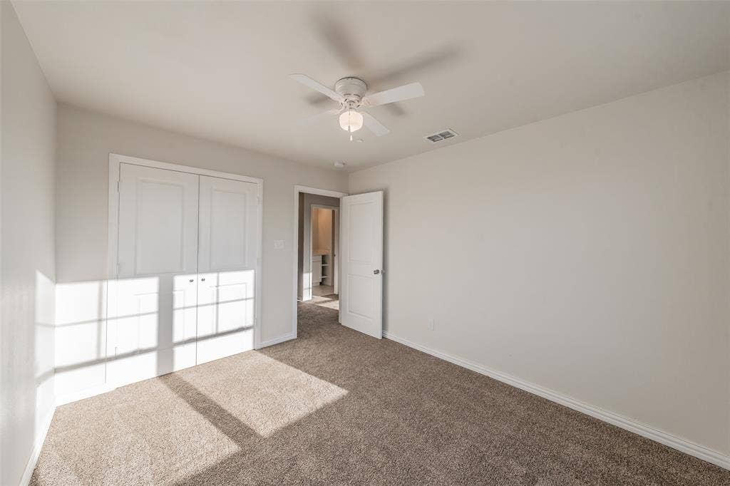 6215 Roby Drive, Arlington, TX 76001 Bedroom 2 with double door closet.