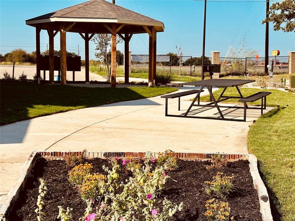 6215 Roby Drive, Arlington, TX 76001 View of property's community featuring a gazebo and a yard