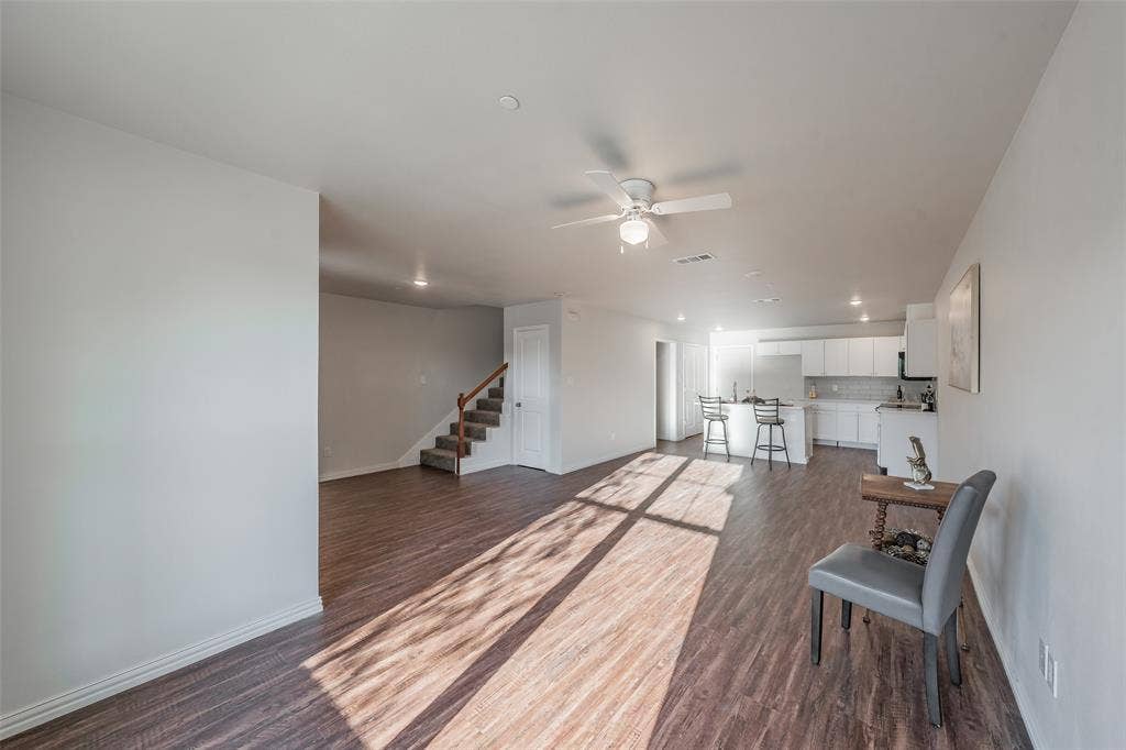 6215 Roby Drive, Arlington, TX 76001 Open concept floor plan , keep all engaged. Stairway lead to all bedrooms and utility area.