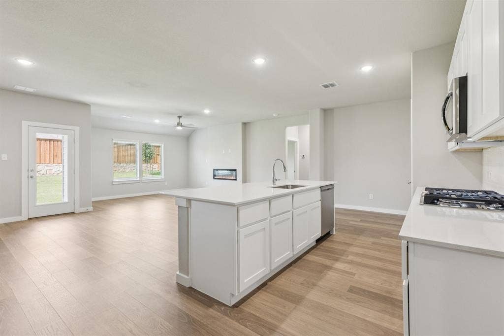 1309 Companero Street, Haslet, TX 76052 Open Floorplan in the Heisman home plan – REPRESENTATIVE PHOTO