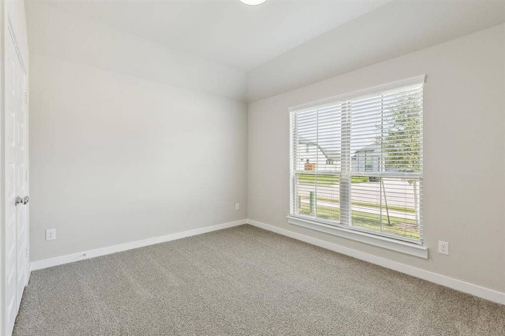 1309 Companero Street, Haslet, TX 76052 Bedroom in the Heisman home plan – REPRESENTATIVE PHOTO