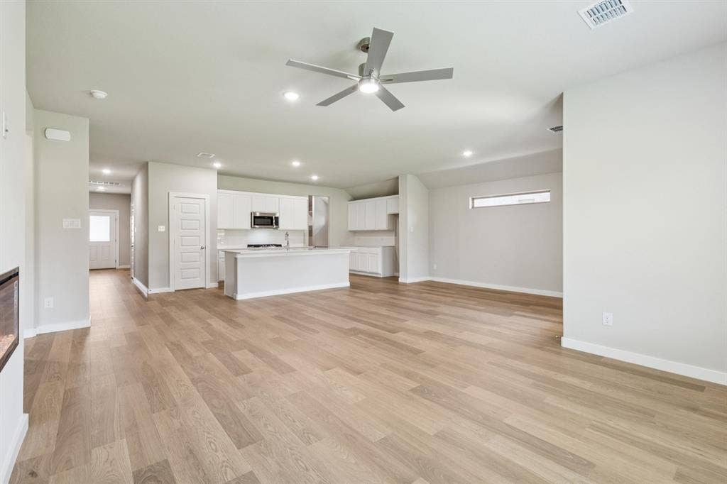 1309 Companero Street, Haslet, TX 76052 Open Floorplan in the Heisman home plan – REPRESENTATIVE PHOTO
