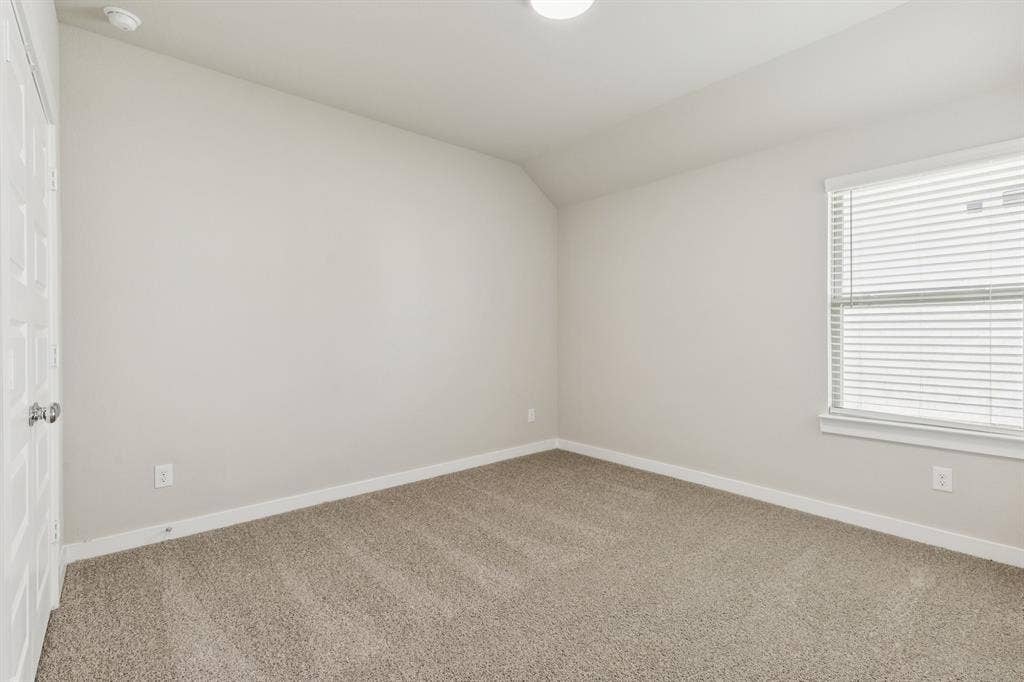 1309 Companero Street, Haslet, TX 76052 Bedroom in the Heisman home plan – REPRESENTATIVE PHOTO