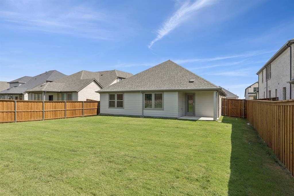 1309 Companero Street, Haslet, TX 76052 Covered Patio in the Heisman home plan – REPRESENTATIVE PHOTO